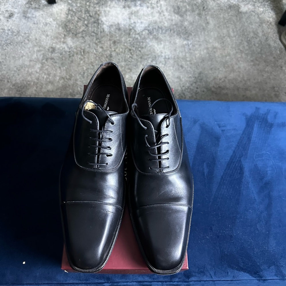 Very original dress or formal shoes